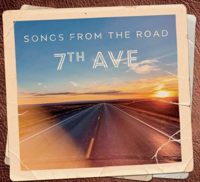 Songs from the Road album artwork with a sunset over an open highway